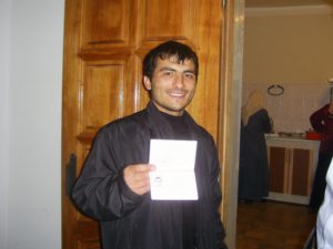 Rasul Kudaev, holding his Russian passport. Rasul Kudaev, a former prisoner of Guantanamo Bay, who was allegedly tortured and ill-treated during his arrest on 23 October 2005, and during the several days he was detained at the Organized Crime Squad (UBOP) in Nalchik, Kabardino-Balkarskaya Republic, the Russian Federation.