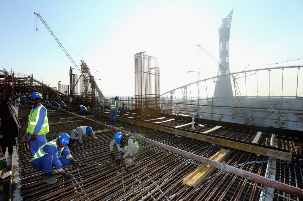 DOHA, QATAR - DECEMBER 30: Construction workers on Khalifa International Stadium ahead of the 2022 FIFA World Cup Qatar on December 30, 2015 in Doha, Qatar. (Photo by Warren Little/Getty Images)