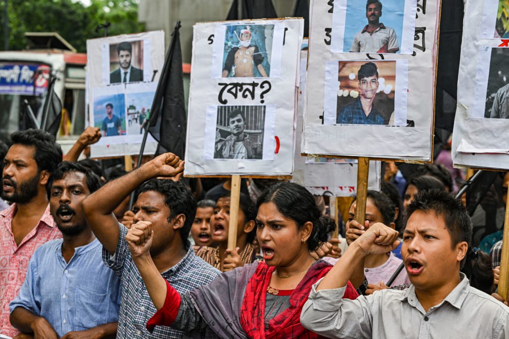 Protesters are taking part in a protest march against the mass arrest and killing of protesters during last week's violence amid anti-quota protests, in Dhaka, Bangladesh, on July 28, 2024. (Photo by Zabed Hasnain Chowdhury/NurPhoto via Getty Images)